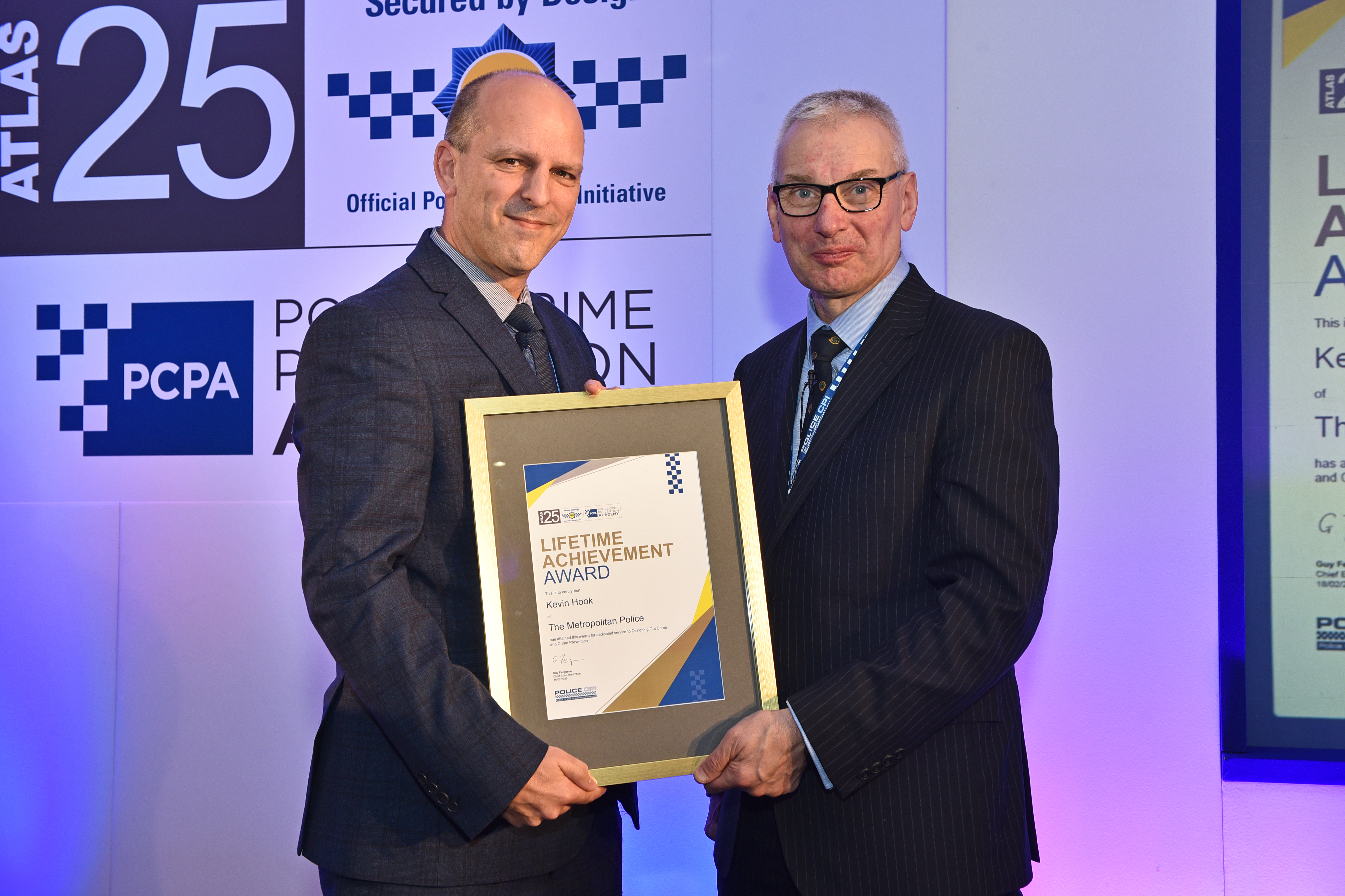 Kevin Hook receives his award